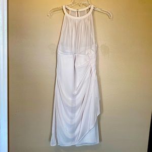 Cream bridal dress. Mid length with halter top zip up.